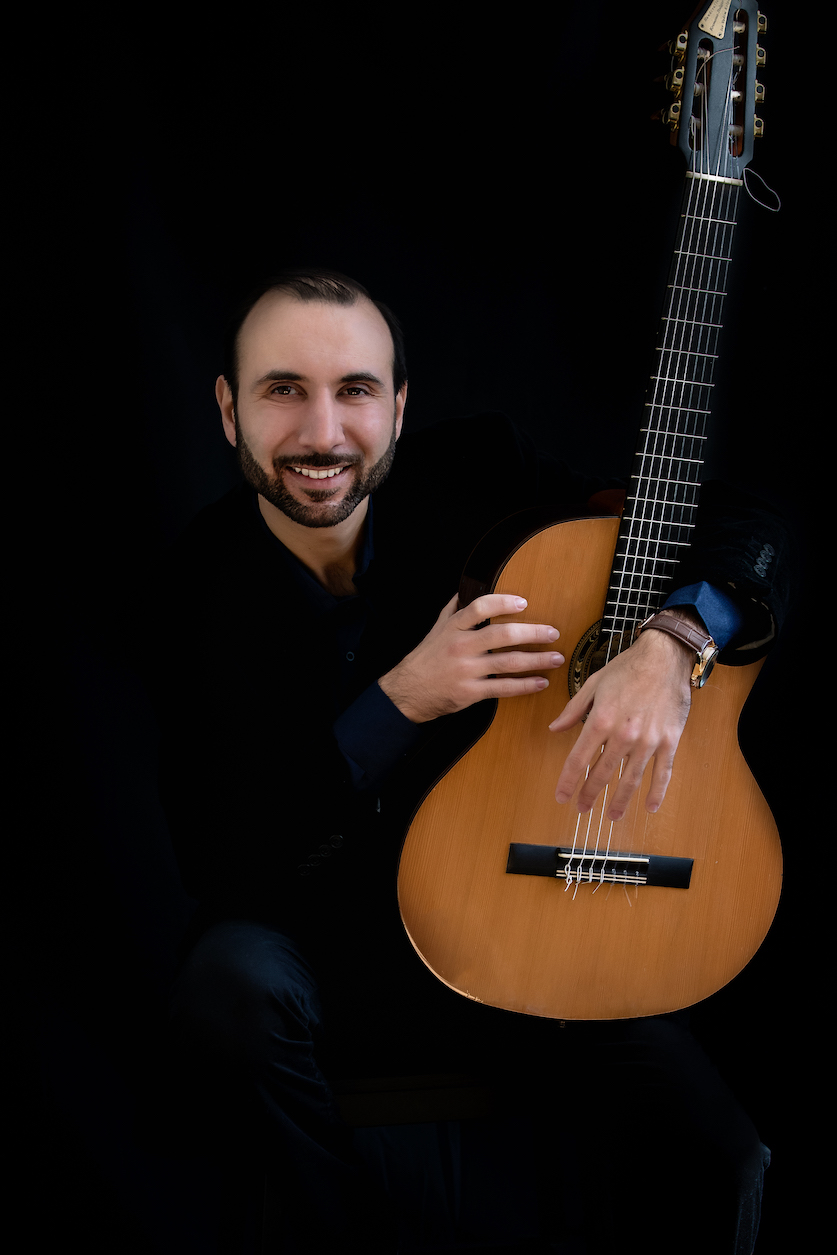 Vadim Kolpakov — Spanish Guitar performing at the Pisco Signature Experience in Charlotte